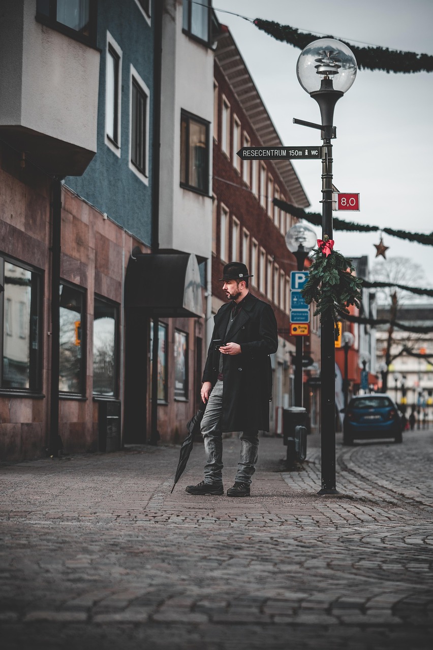 city, man, coat, umbrella, hat, cobblestone, outdoors, travel, tourism